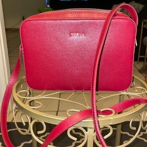 Red leather Furla handbag.